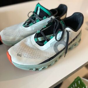 On Running White and Green Athletic Shoes with Cushioned Midsole
